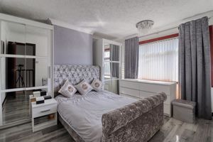 Bedroom One- click for photo gallery